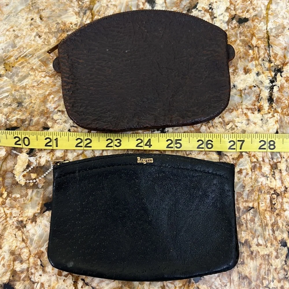 Vintage two leather wallets .